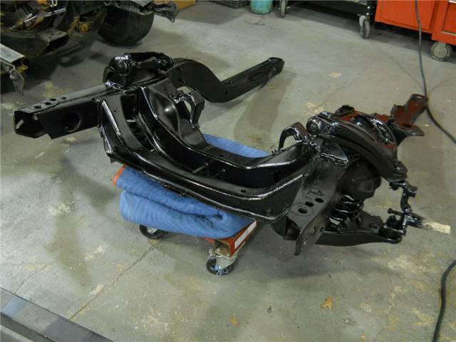 Subframe ready for assembly. Drum brakes were ditched and going to instsall disc brakes.