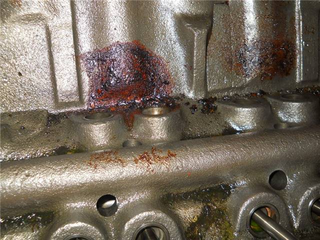 After pulling off the intake for cleaning we found rust in the lifter valley.