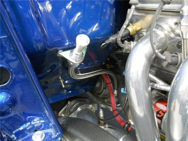 Lokar firewall mounted transmission dipstick.